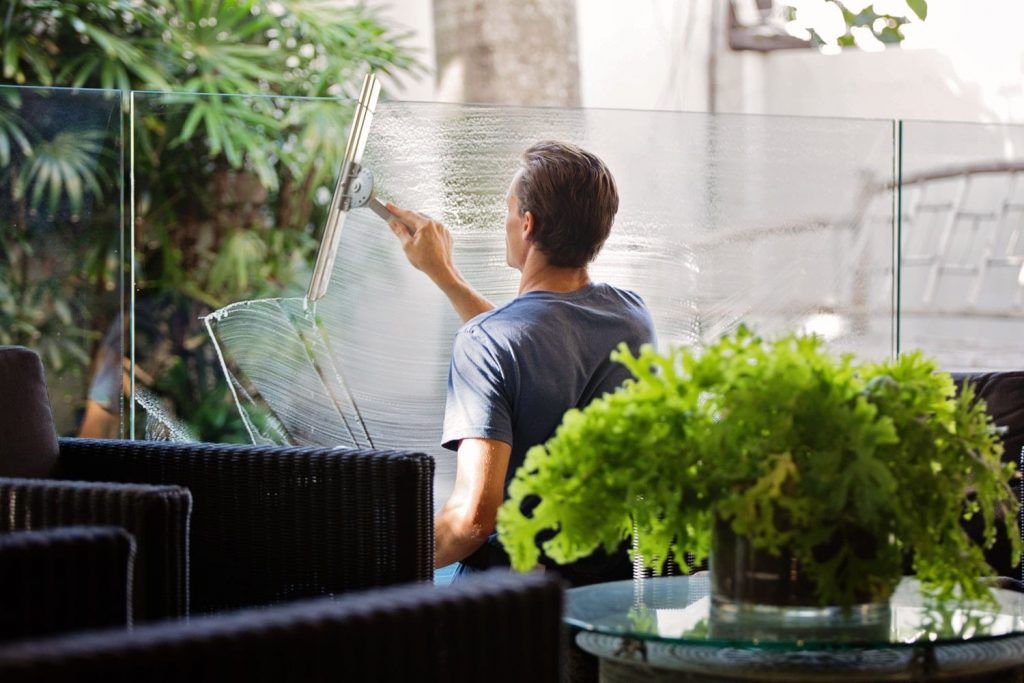 Man cleaning window